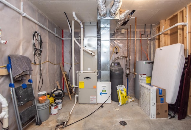 utility room with electric water heater