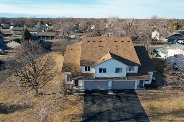 drone / aerial view with a residential view