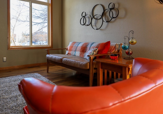 living area featuring wood finished floors