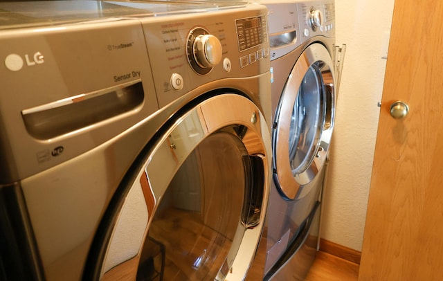 laundry room featuring laundry area and separate washer and dryer