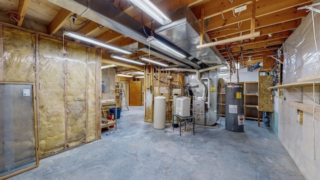 unfinished below grade area with heating unit and electric water heater