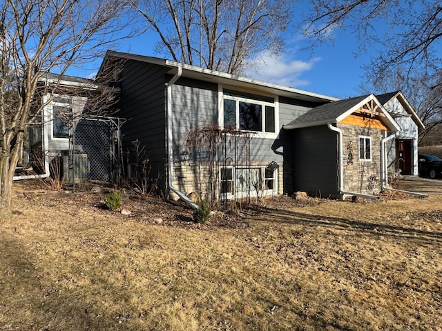 view of front of property featuring stone siding