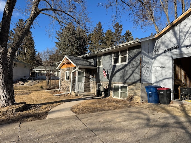 view of front of house featuring concrete driveway