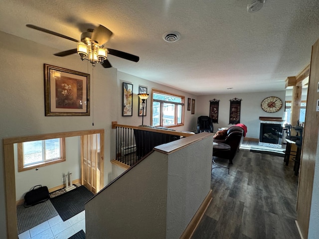 1903 Lenore Ln, Red Wing, MN 55066 - hallway featuring an upstairs landing and a textured ceiling