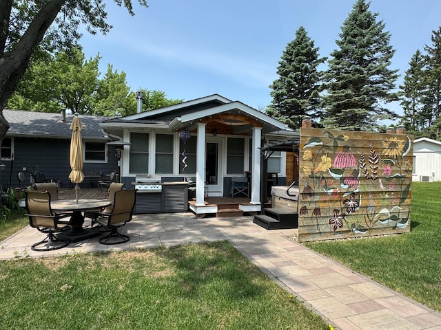 1903 Lenore Ln, Red Wing, MN 55066 - back of house with a yard and a patio area