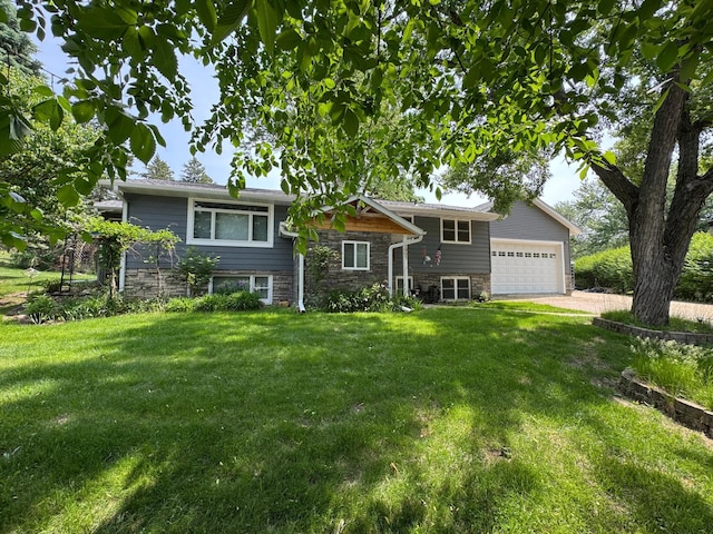1903 Lenore Ln, Red Wing, MN 55066 - raised ranch with stone siding, a front lawn, a garage, and driveway