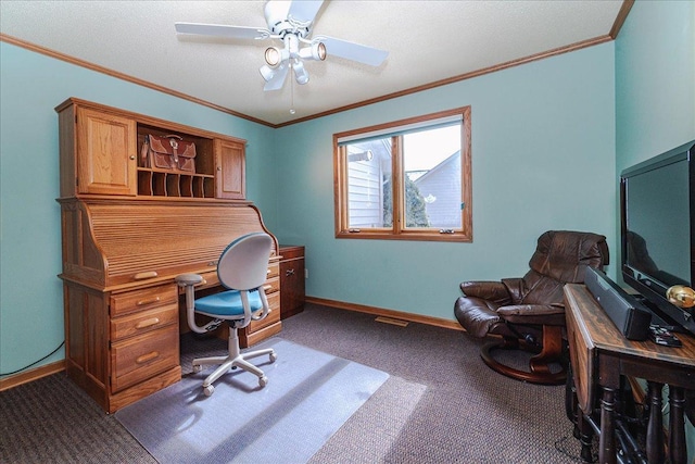 carpeted home office with ornamental molding, visible vents, ceiling fan, and baseboards