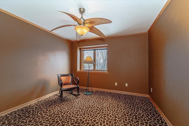 unfurnished room featuring ornamental molding, carpet, ceiling fan, and baseboards