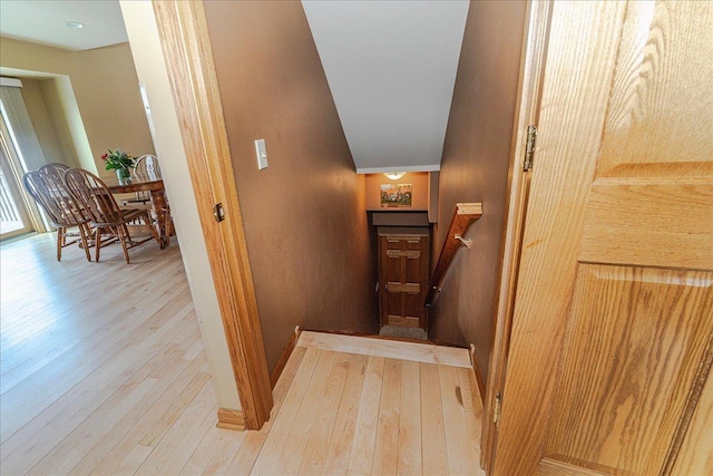 stairway with wood-type flooring