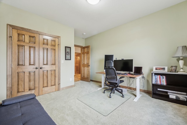 office with carpet flooring and baseboards