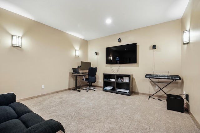 carpeted home office with baseboards