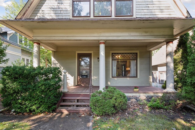 doorway to property with covered porch