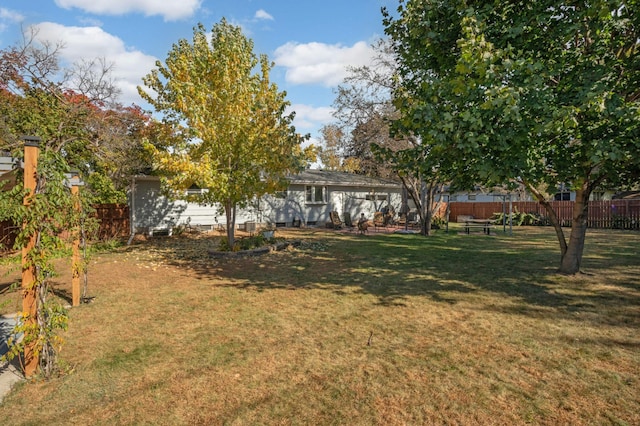 view of yard with fence