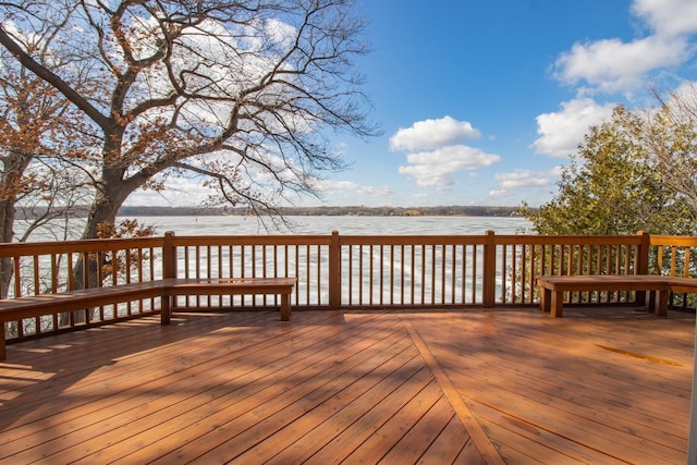 deck featuring a water view