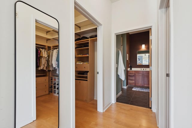 hallway featuring wood finished floors