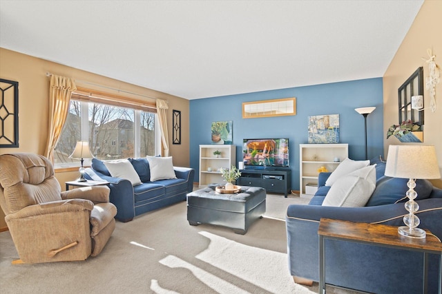 living area featuring carpet floors