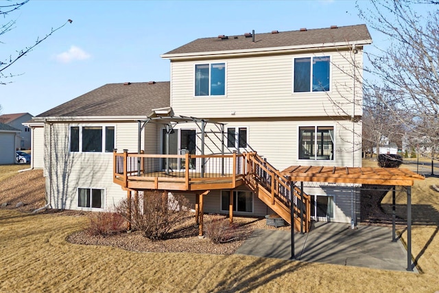 back of house featuring a shingled roof, a patio, a wooden deck, and a pergola