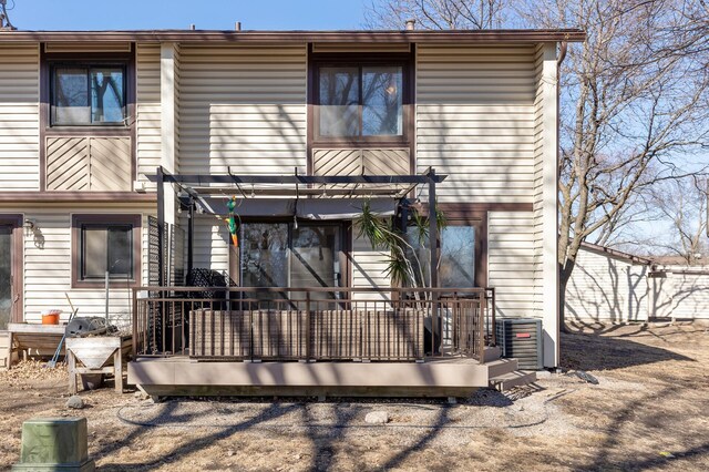 back of house with a pergola