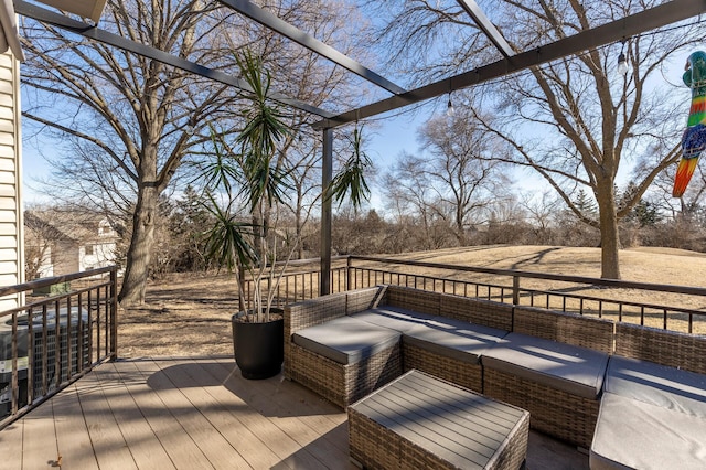 wooden terrace with outdoor lounge area