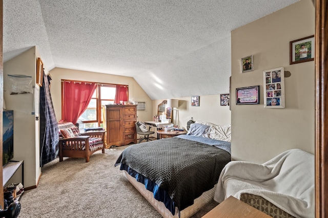 carpeted bedroom with vaulted ceiling and a textured ceiling