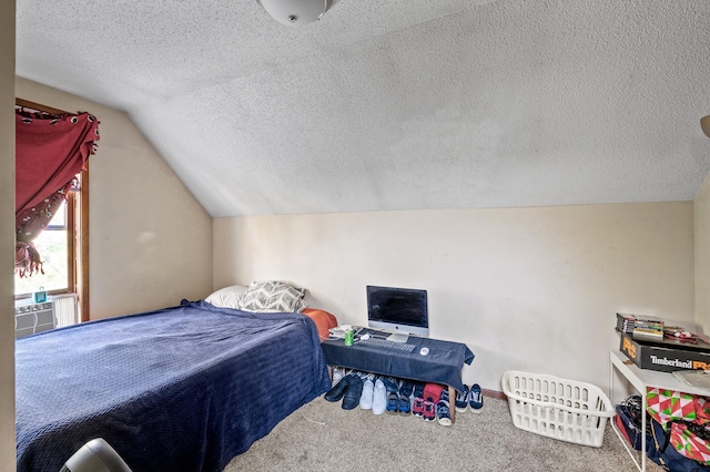 carpeted bedroom featuring lofted ceiling, a textured ceiling, and cooling unit