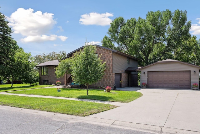 view of front facade with a garage, an outbuilding, a front yard, and brick siding