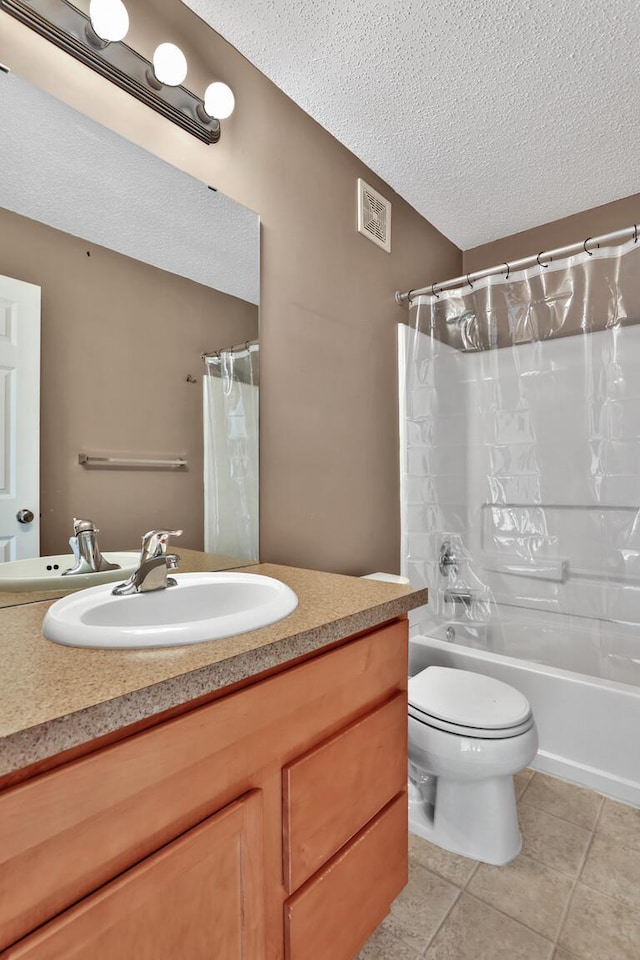 full bath with tile patterned floors, toilet, visible vents, and a textured ceiling