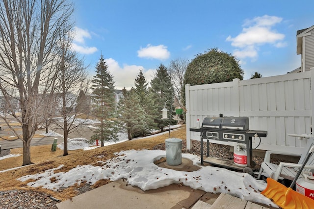 view of patio featuring a grill