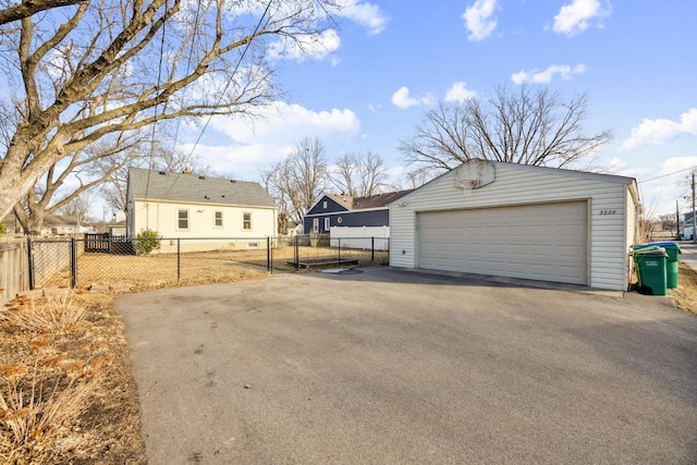 detached garage with fence