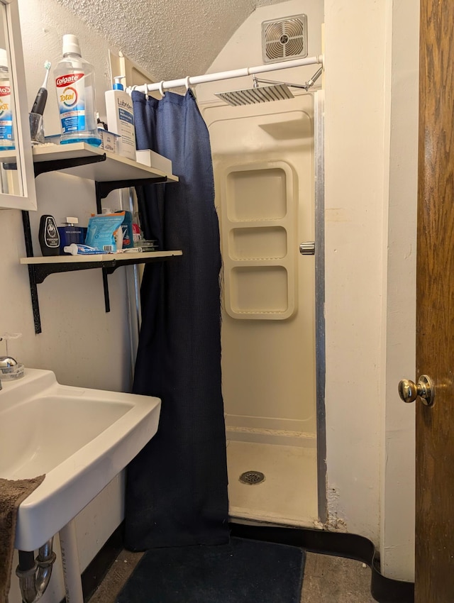 full bathroom featuring a stall shower