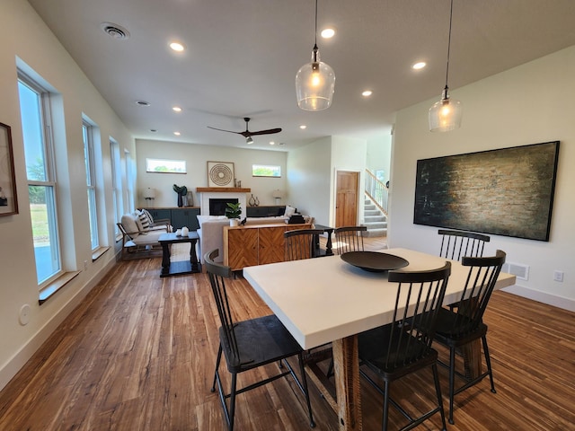 6624 Captains Cir NW, Sauk Rapids, MN 56379 - dining space featuring plenty of natural light, stairs, a ceiling fan, dark wood-style floors, and recessed lighting