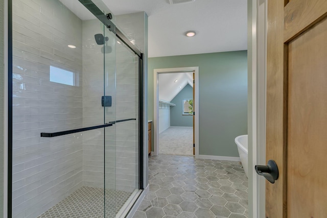 6624 Captains Cir NW, Sauk Rapids, MN 56379 - bathroom with a stall shower, a freestanding tub, tile patterned flooring, healthy amount of natural light, and recessed lighting