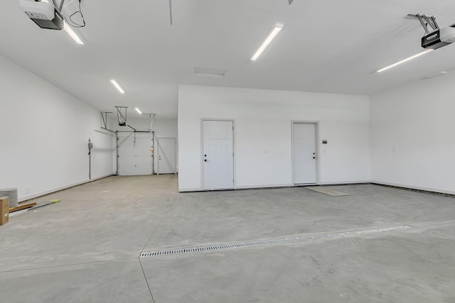6624 Captains Cir NW, Sauk Rapids, MN 56379 - garage featuring a garage door opener