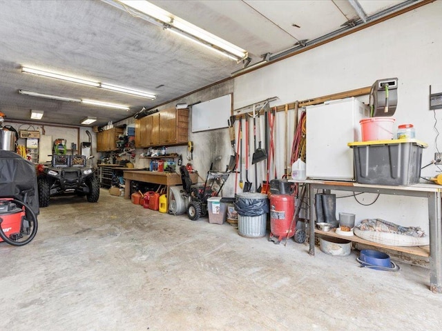 garage featuring a workshop area