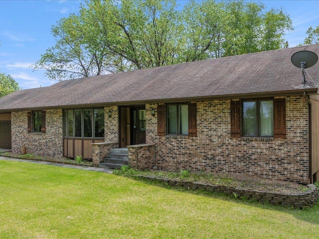 3365 State 200 NE, Remer, MN 56672 - ranch-style home with brick siding and a front yard