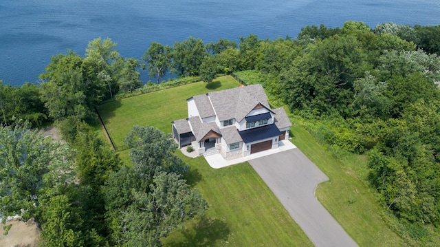 drone / aerial view with a water view