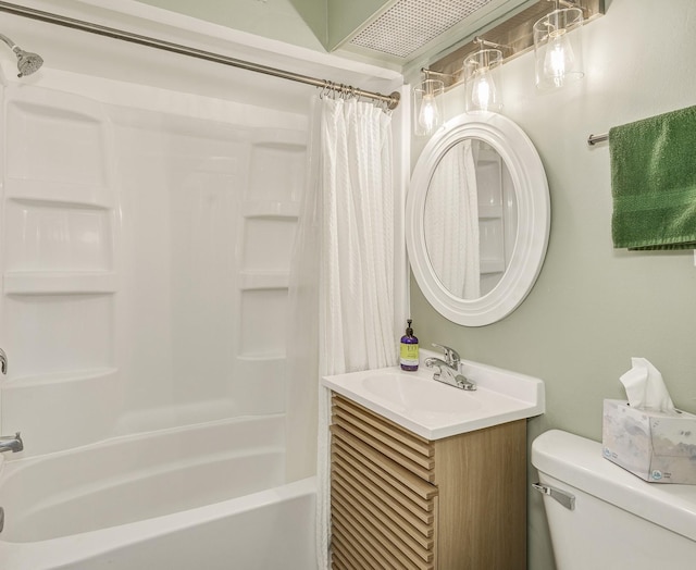 bathroom with vanity, shower / bath combination with curtain, and toilet