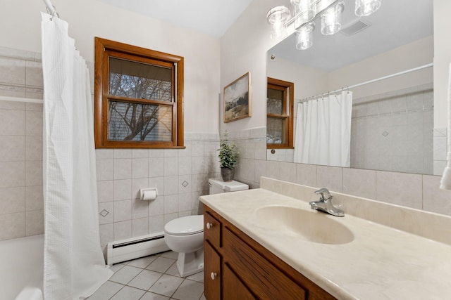 full bath featuring tile walls, visible vents, toilet, baseboard heating, and tile patterned flooring