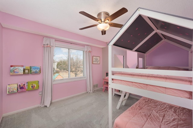 carpeted bedroom featuring a ceiling fan and baseboards