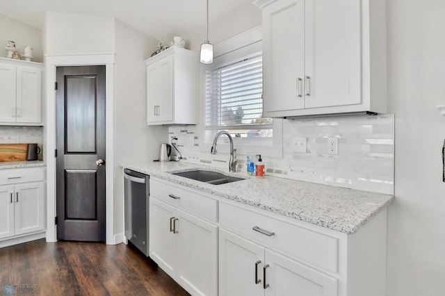 kitchen featuring a sink, white cabinetry, dark wood-type flooring, and stainless steel dishwasher