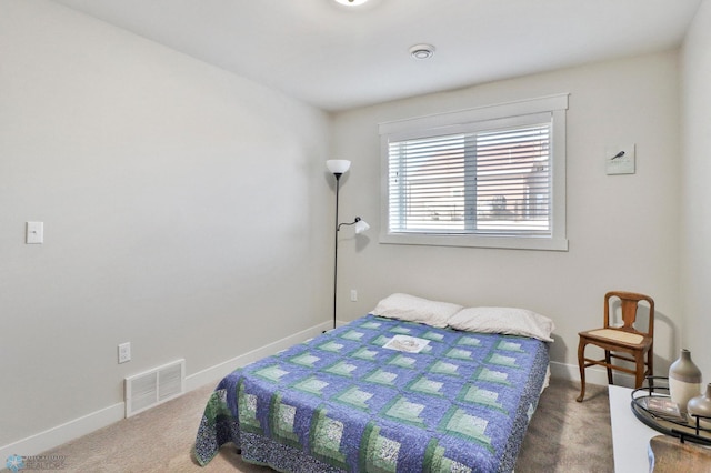 bedroom with carpet, baseboards, and visible vents