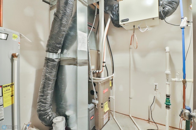 utility room with water heater