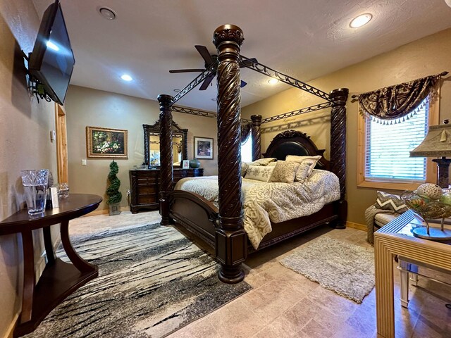 bedroom with baseboards, ceiling fan, and recessed lighting