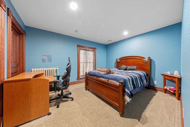 carpeted bedroom featuring baseboards, recessed lighting, and radiator