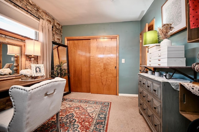 interior space featuring carpet and baseboards