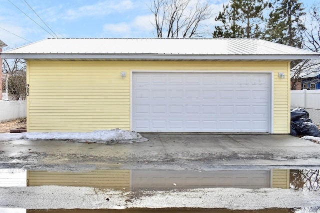 detached garage with fence