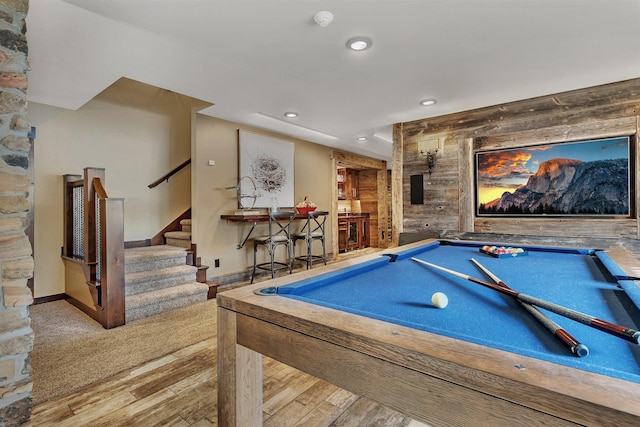 rec room with pool table, wood walls, wood finished floors, and recessed lighting