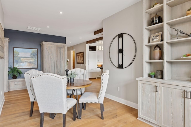 875 Lake St N Unit 402, Wayzata, MN 55391 - dining area featuring light wood-type flooring, visible vents, baseboards, and recessed lighting