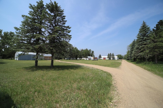 view of street featuring driveway