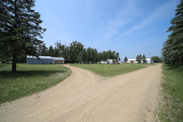 view of road with driveway